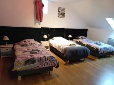 Un ou plusieurs lits dans un hébergement de l'établissement Gite du Prieure