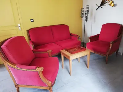 Coin salon dans l'établissement LA MAISON D'ALIDA