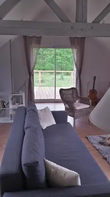 Coin salon dans l'établissement Appartement des Grands Champs avec terrasse