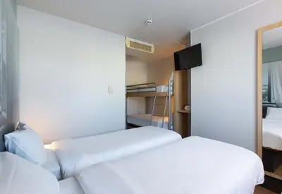 Un ou plusieurs lits dans un hébergement de l'établissement B&B HOTEL Blois Sud Vineuil