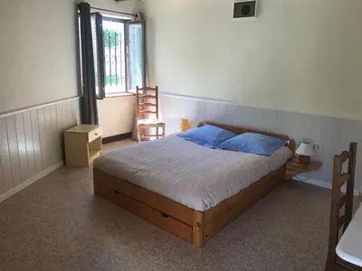 Un ou plusieurs lits dans un hébergement de l'établissement Gite Maison de campagne 86120-22 couchages