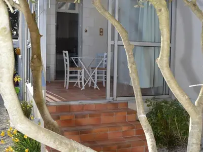Balcon ou terrasse dans l'établissement Gîte confortable, animaux acceptés, jardin clos - FR-1-381-47