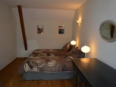 Un ou plusieurs lits dans un hébergement de l'établissement Gîte confortable à Huismes, proche de Chinon avec cour fermée - FR-1-381-370