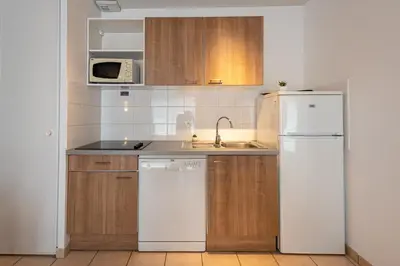 Cuisine ou kitchenette dans l'établissement Terres de France - Le Domaine Du Golf