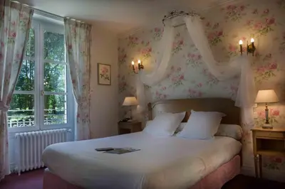 Un ou plusieurs lits dans un hébergement de l'établissement Chateau de la Rozelle