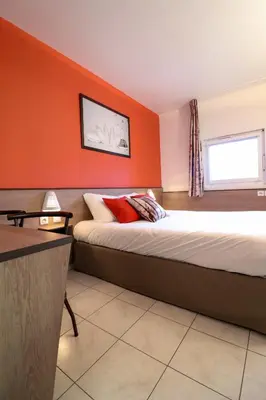 Un ou plusieurs lits dans un hébergement de l'établissement ACE Hôtel Travel Athée sur Cher - A85 Aire du Val de Cher