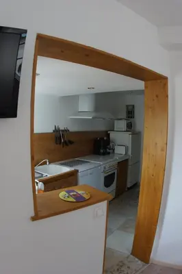 Cuisine ou kitchenette dans l'établissement le petit nid