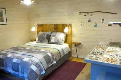 Un ou plusieurs lits dans un hébergement de l'établissement Maisonnette indépendante