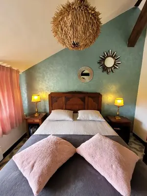 Un ou plusieurs lits dans un hébergement de l'établissement Guest House 