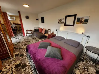 Coin salon dans l'établissement Guest House 