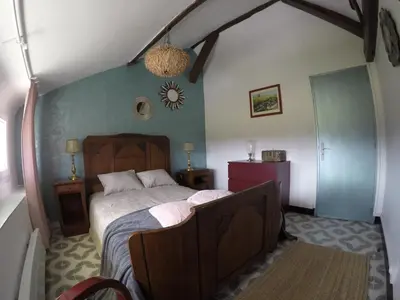 Un ou plusieurs lits dans un hébergement de l'établissement Guest House 