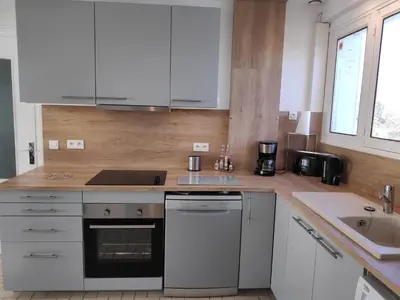 Cuisine ou kitchenette dans l'établissement Le petit Husseau