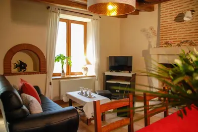 Télévision ou salle de divertissement dans l'établissement Gîtes Les Closeaux