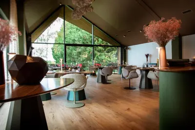 Coin salon dans l'établissement Auberge Pom'Poire