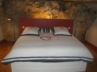 Un ou plusieurs lits dans un hébergement de l'établissement Gite La Suite Ducale Chateau La Roche Racan