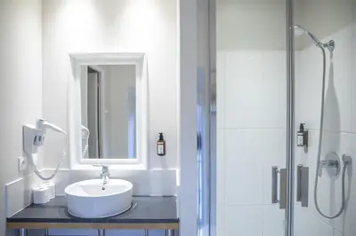 Salle de bains dans l'établissement Hotel Beauvilliers