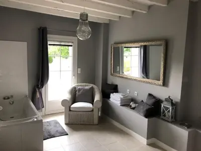 Coin salon dans l'établissement SUITE ROMANTIQUe