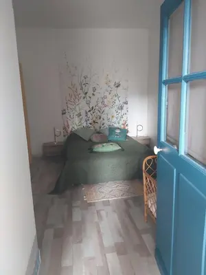 Coin salon dans l'établissement Gîte OZOO