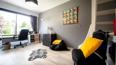 Coin salon dans l'établissement Le champ du Renne