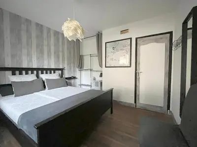 Un ou plusieurs lits dans un hébergement de l'établissement Chez Flo & Marc - Chambres d'hôtes entre Blois et Chaumont