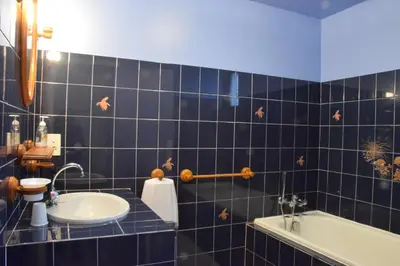 Salle de bains dans l'établissement La ferme des Cailloux