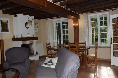 Coin salon dans l'établissement La ferme des Cailloux