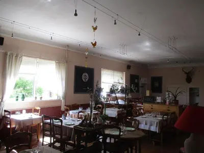 Restaurant ou autre lieu de restauration dans l'établissement Auberge 