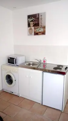 Cuisine ou kitchenette dans l'établissement Bellevue
