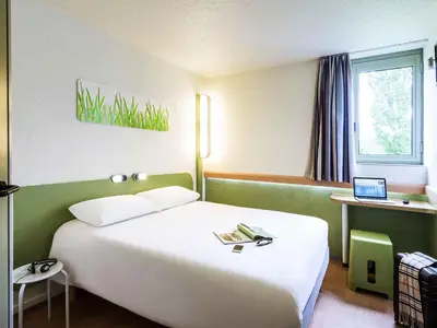 Un ou plusieurs lits dans un hébergement de l'établissement ibis budget Châtellerault Nord