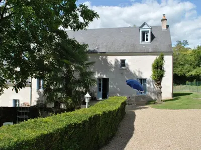 Jardin de l'établissement Gîte familial confortable dans un ancien moulin avec jardin - FR-1-381-6