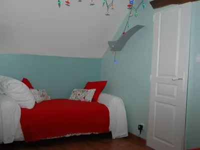 Un ou plusieurs lits dans un hébergement de l'établissement Gîte authentique à Brizay avec jardin privé et piscine - FR-1-381-238