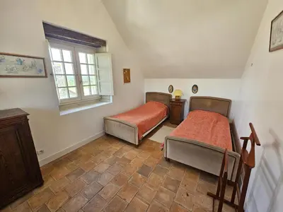 Un ou plusieurs lits dans un hébergement de l'établissement Charmante maison de campagne dans une ferme rénovée - FR-1-381-262