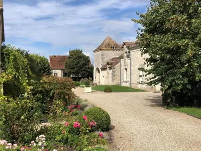 Jardin de l'établissement Charmante maison de campagne dans une ferme rénovée - FR-1-381-262