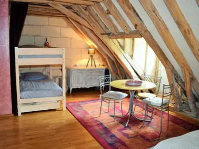 Un ou plusieurs lits dans un hébergement de l'établissement Gîte de Charme Rénové, Idéal Famille, Centre-Ville, WiFi, Parking Gratuit, Vélo Bienvenue - FR-1-381-268