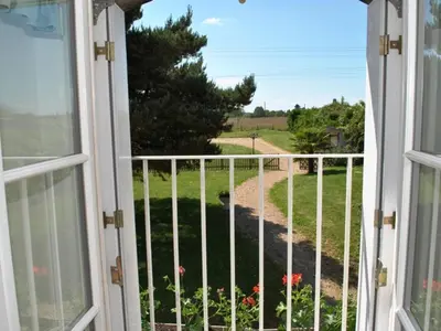 Jardin de l'établissement Gîte spacieux proche Tours, idéal pour familles - FR-1-381-359