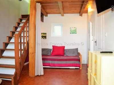 Coin salon dans l'établissement Charmante maison proche Châteaux de la Loire - FR-1-381-371