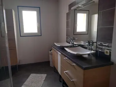 Salle de bains dans l'établissement Maison individuelle