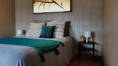 Un ou plusieurs lits dans un hébergement de l'établissement Manège de la Chapinière - DadaLoge tiny-house