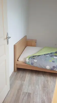 Un ou plusieurs lits dans un hébergement de l'établissement Chambre chez habitant