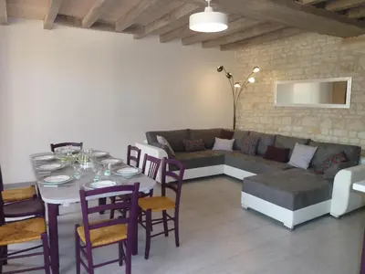 Coin salon dans l'établissement LES 3 PETITS COCHONS