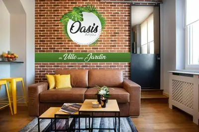 Coin salon dans l'établissement Oasis Anjou