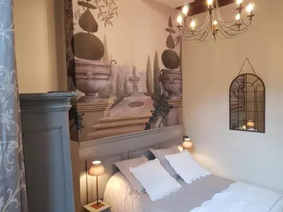 Un ou plusieurs lits dans un hébergement de l'établissement Hotel Particulier Robin Quantin