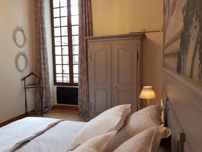 Un ou plusieurs lits dans un hébergement de l'établissement Hotel Particulier Robin Quantin