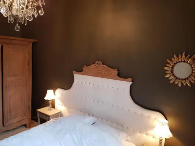 Un ou plusieurs lits dans un hébergement de l'établissement Hotel Particulier Robin Quantin