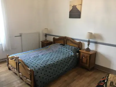 Un ou plusieurs lits dans un hébergement de l'établissement Le Studio Gambetta