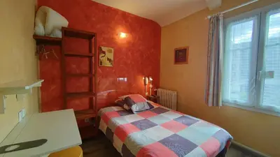 Un ou plusieurs lits dans un hébergement de l'établissement Hôtel Saint Jean