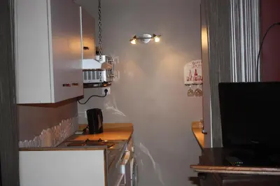 Cuisine ou kitchenette dans l'établissement Chambres d'Hôtes La Vallée des Vignes