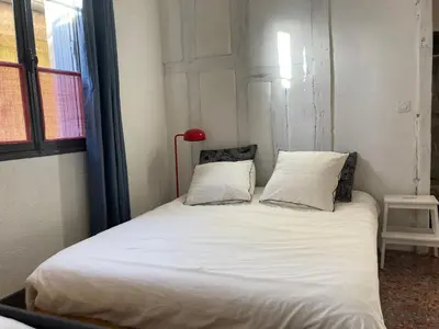Un ou plusieurs lits dans un hébergement de l'établissement Blanqui Loft