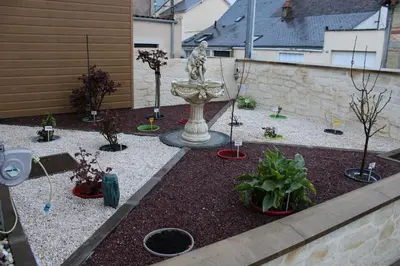 Jardin de l'établissement L'Escale Chambre chez l'habitant