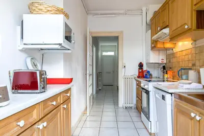 Cuisine ou kitchenette dans l'établissement Maison 88 m2 le patio du centre ville avec garage